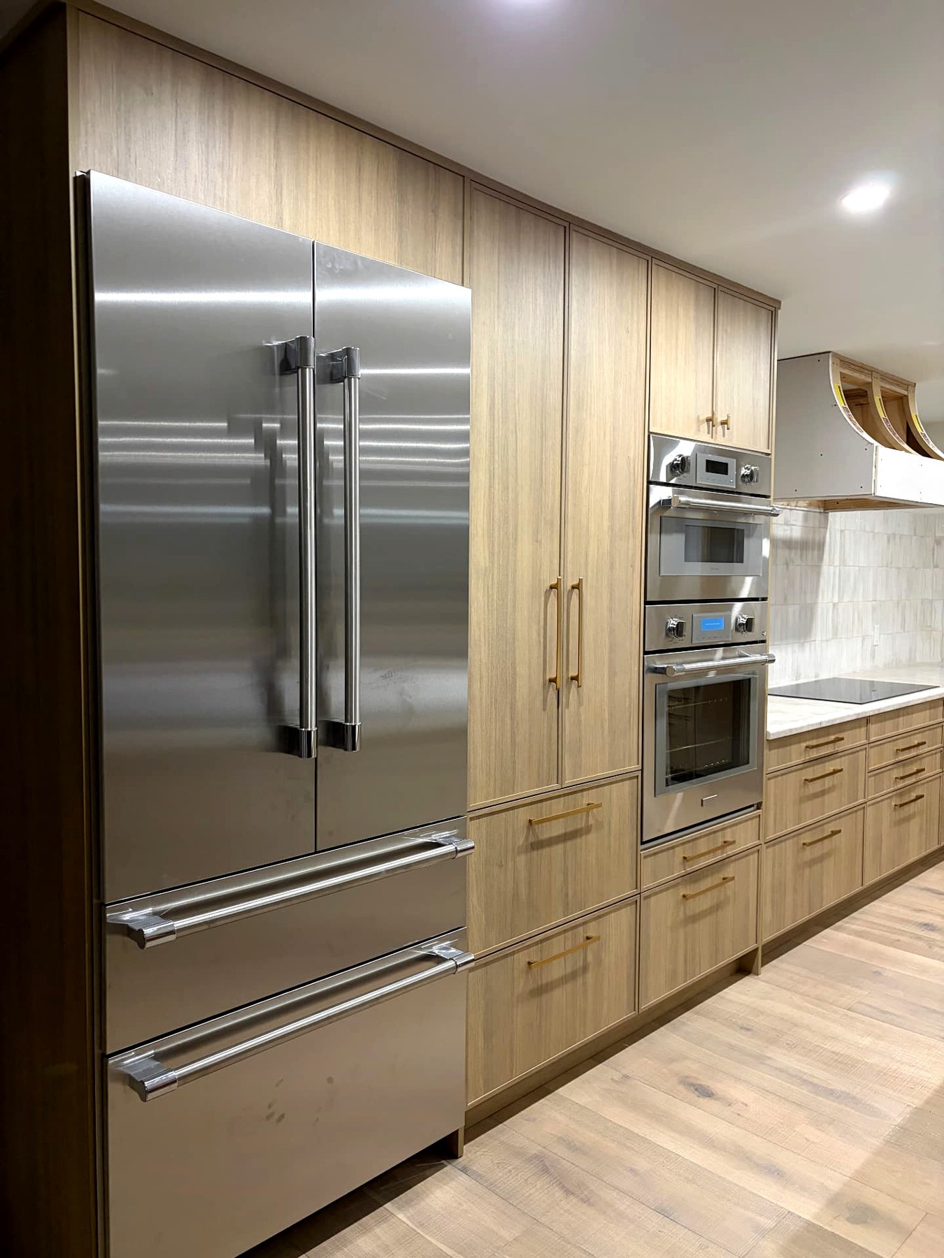Phoenix home remodel kitchen with wood cabinetry and stainless appliances